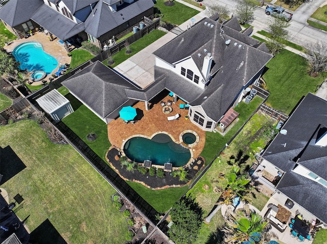 birds eye view of property with a residential view