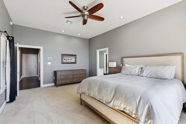 bedroom with baseboards, visible vents, recessed lighting, ceiling fan, and light carpet