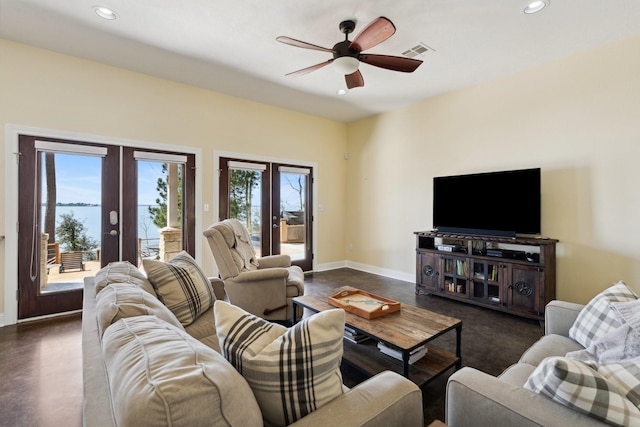 living room with visible vents, a ceiling fan, recessed lighting, french doors, and baseboards
