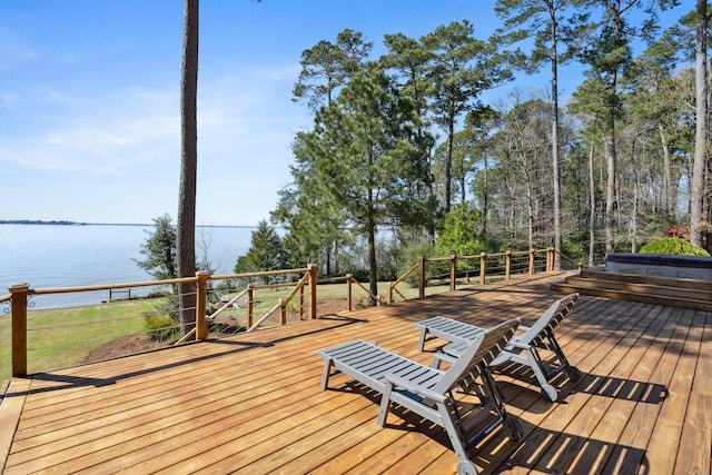 deck featuring a water view