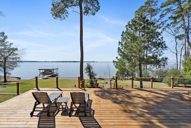 wooden terrace with a water view