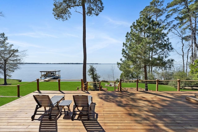 deck featuring a yard and a water view