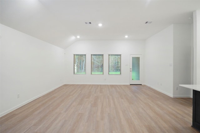 unfurnished living room with visible vents, recessed lighting, baseboards, and light wood-style floors