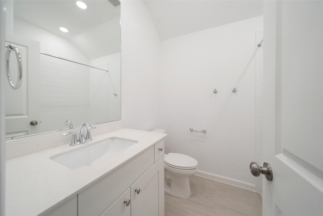 bathroom with baseboards, walk in shower, toilet, recessed lighting, and vanity