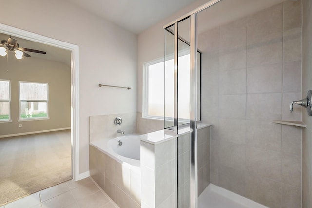 bathroom with baseboards, ceiling fan, a shower stall, tile patterned floors, and a bath