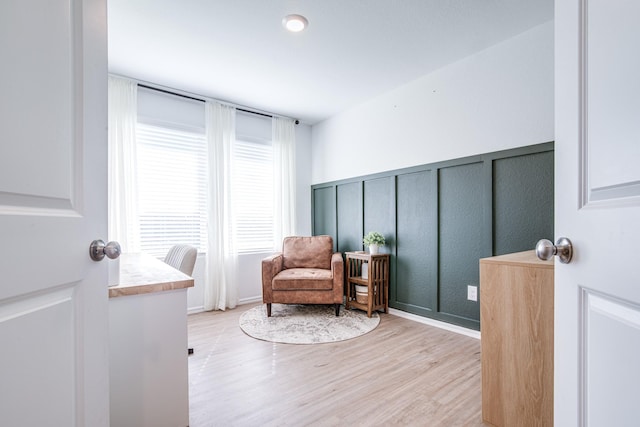 sitting room with light wood-type flooring