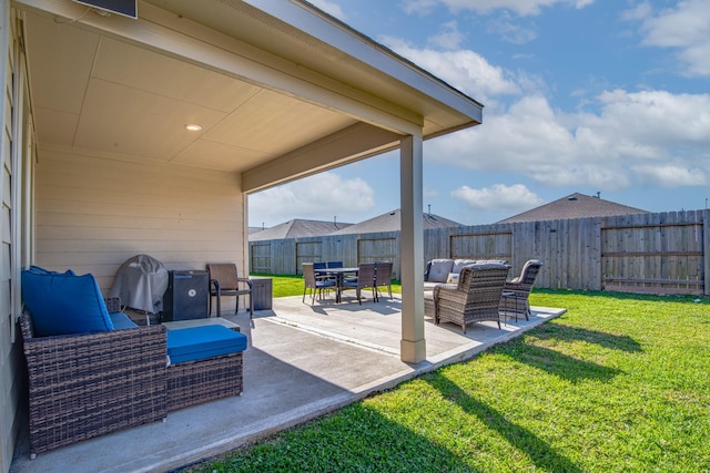 view of patio / terrace featuring an outdoor hangout area and a fenced backyard