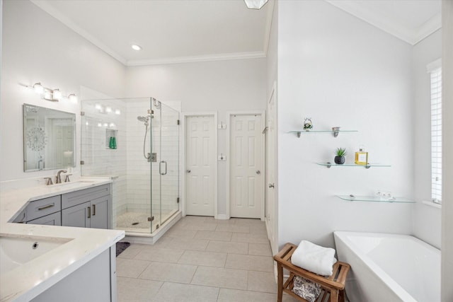 full bathroom featuring vanity, a shower stall, and crown molding