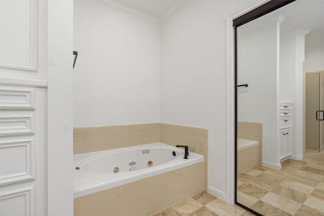 full bath featuring a shower stall, a jetted tub, and ornamental molding