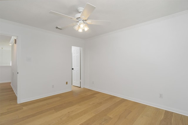 unfurnished room with light wood-type flooring, ceiling fan, and crown molding