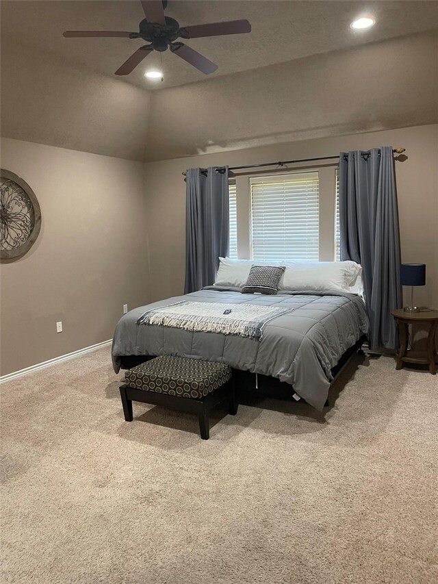 carpeted bedroom with recessed lighting, ceiling fan, baseboards, and vaulted ceiling