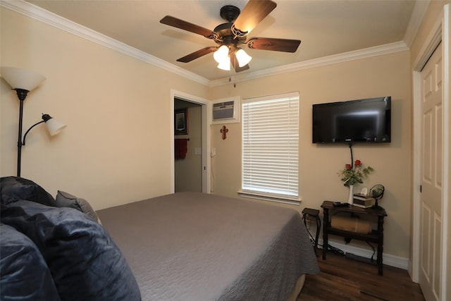 bedroom with crown molding, baseboards, dark wood-style floors, a closet, and a ceiling fan