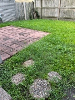 view of yard with a patio area and fence