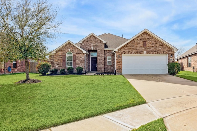 ranch-style house with brick siding, an attached garage, concrete driveway, and a front yard