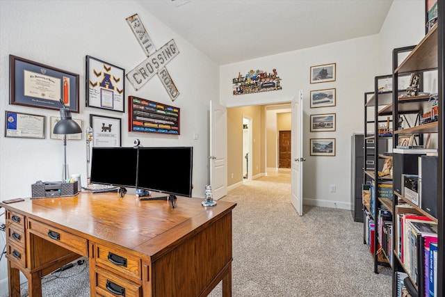 office featuring baseboards and carpet floors