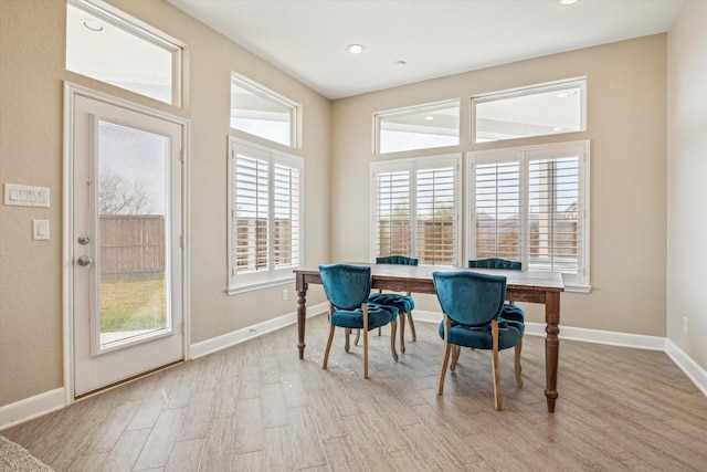 office featuring recessed lighting, baseboards, and light wood finished floors