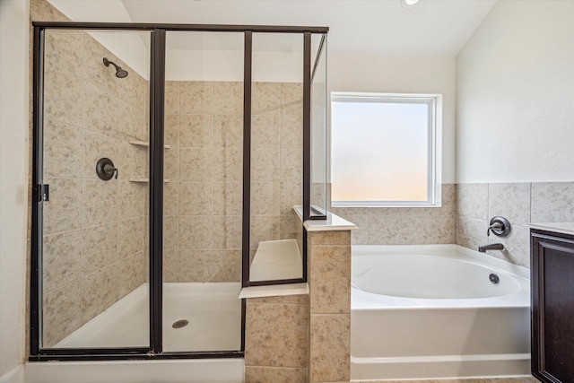 full bathroom featuring a shower stall and a bath