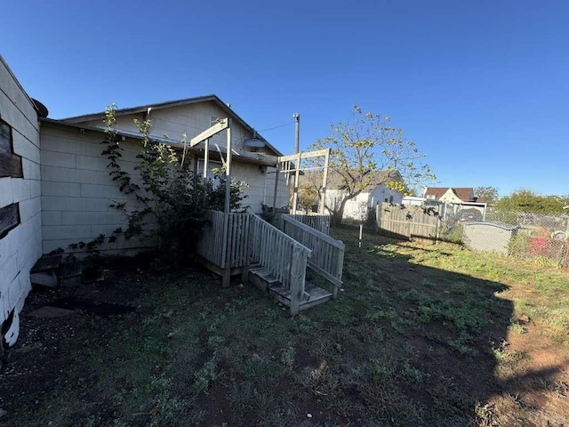 view of yard featuring fence