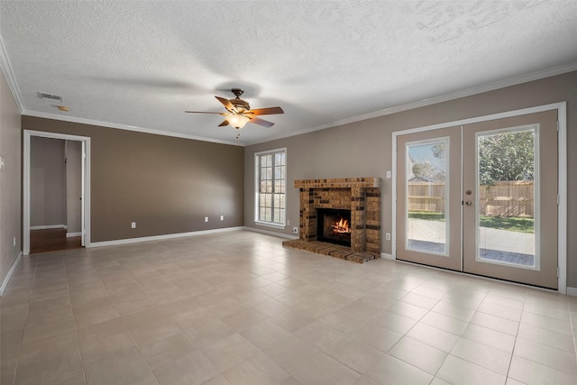 unfurnished living room with visible vents, crown molding, a ceiling fan, and french doors