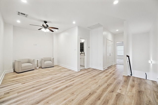 unfurnished room with recessed lighting, visible vents, and light wood-type flooring