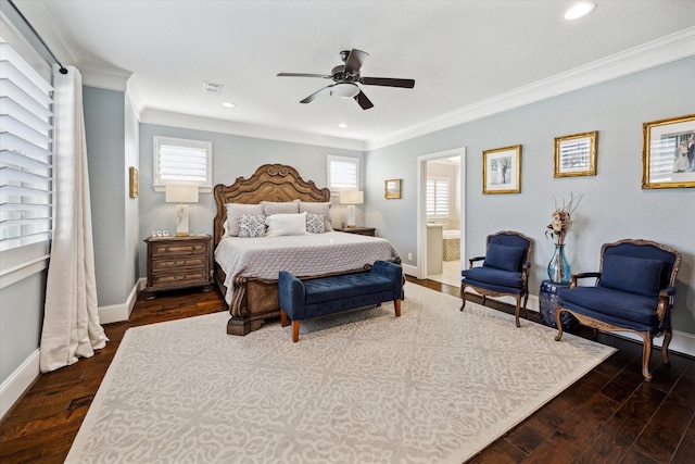 bedroom with ornamental molding, wood finished floors, visible vents, and baseboards