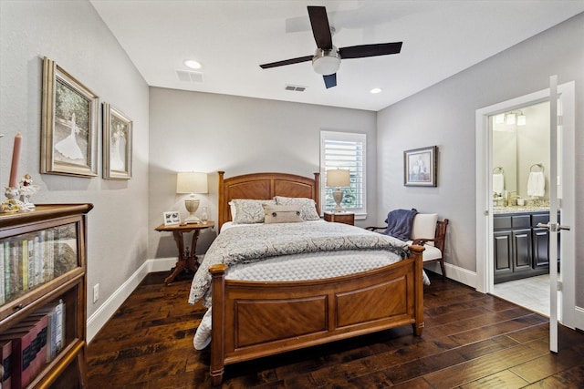 bedroom with visible vents, baseboards, and dark wood-style flooring