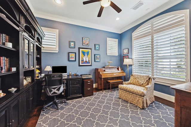 home office with visible vents, baseboards, ceiling fan, and ornamental molding