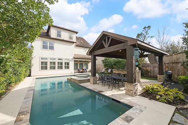 view of pool featuring a gazebo, a fenced in pool, a patio, and a fenced backyard