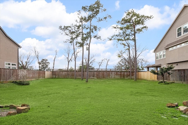 view of yard featuring a fenced backyard