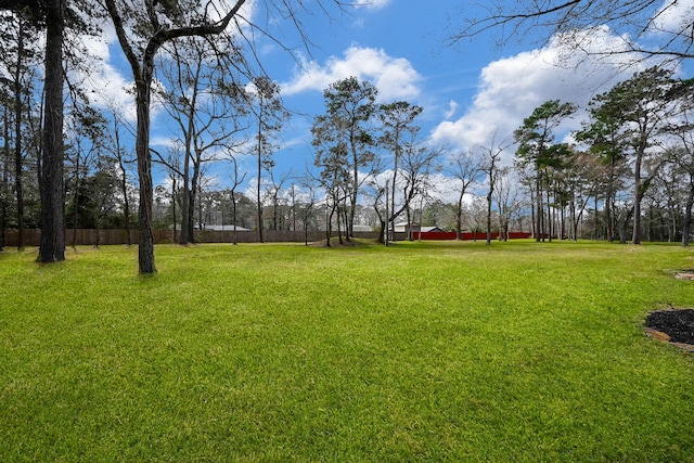 view of yard featuring fence