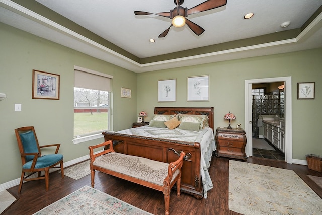 bedroom with recessed lighting, baseboards, and dark wood-style flooring