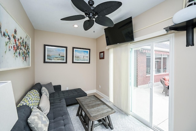 living area featuring recessed lighting, baseboards, and ceiling fan