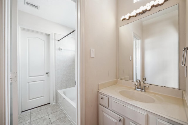 full bathroom featuring tile patterned flooring, visible vents, vanity, and bathing tub / shower combination