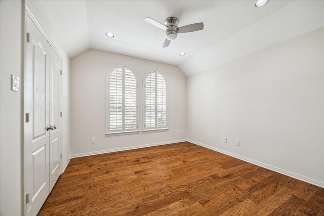 unfurnished room with wood finished floors, baseboards, recessed lighting, ceiling fan, and vaulted ceiling