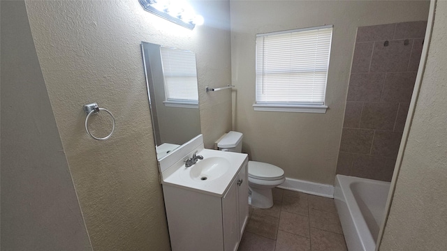 full bath with tile patterned flooring, baseboards, toilet, a textured wall, and vanity