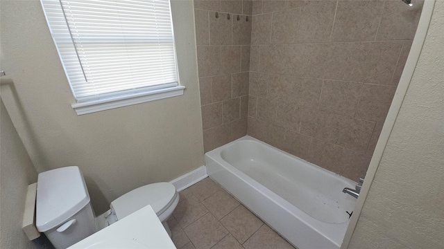 bathroom featuring tile patterned flooring, shower / bathing tub combination, toilet, and baseboards