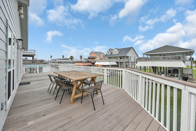 22110 Deaf P Smith Dr, Galveston, TX 77554 - deck featuring a residential view and outdoor dining area