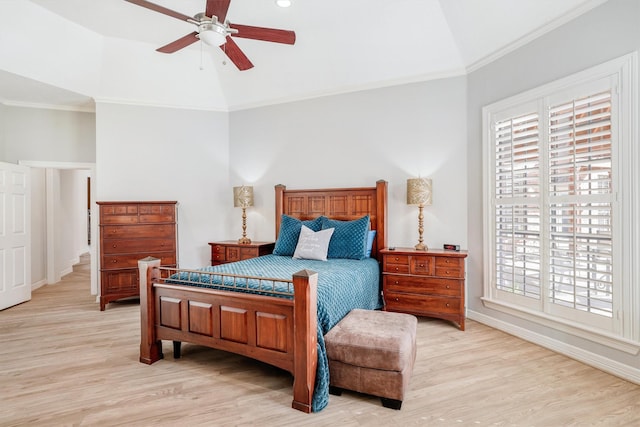 bedroom featuring lofted ceiling, baseboards, light wood finished floors, and ornamental molding