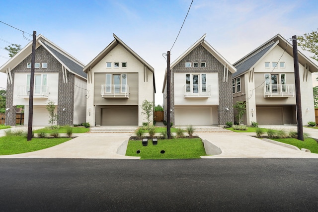 view of front facade featuring an attached garage and concrete driveway