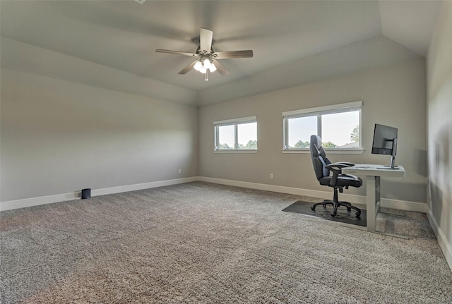 office space with vaulted ceiling, baseboards, and carpet floors