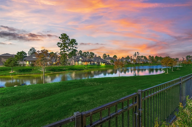 view of water feature with fence