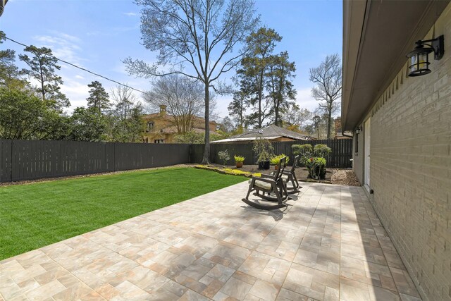 view of patio featuring a fenced backyard