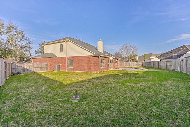 view of yard featuring a patio area, cooling unit, and a fenced backyard