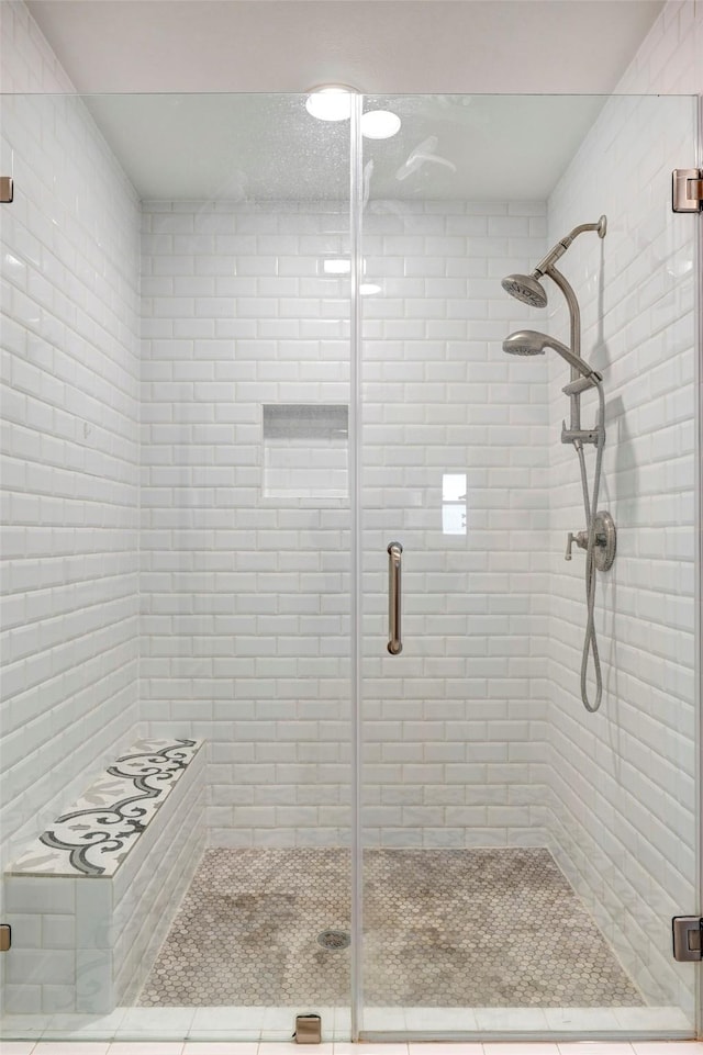 full bathroom with a stall shower