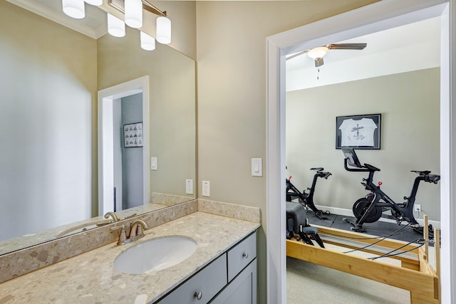 bathroom featuring ceiling fan and vanity