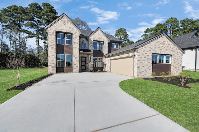 view of front facade featuring concrete driveway, a garage, brick siding, and a front yard