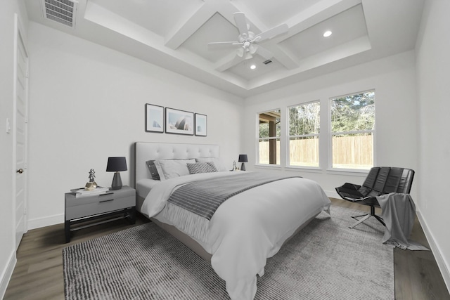 bedroom featuring visible vents, baseboards, recessed lighting, wood finished floors, and coffered ceiling