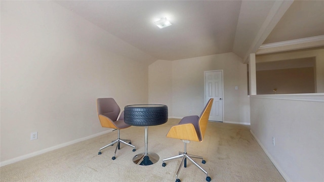 office area with vaulted ceiling, carpet, and baseboards