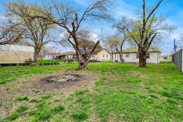 view of yard featuring fence