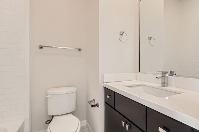 126 Pierce St, Houston, TX 77002 - bathroom with toilet, vanity, and baseboards